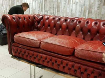 Faded Chesterfield sofa