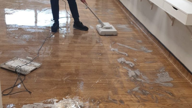 Professional Hard floor cleaning service restoring a hard floor to like-new condition